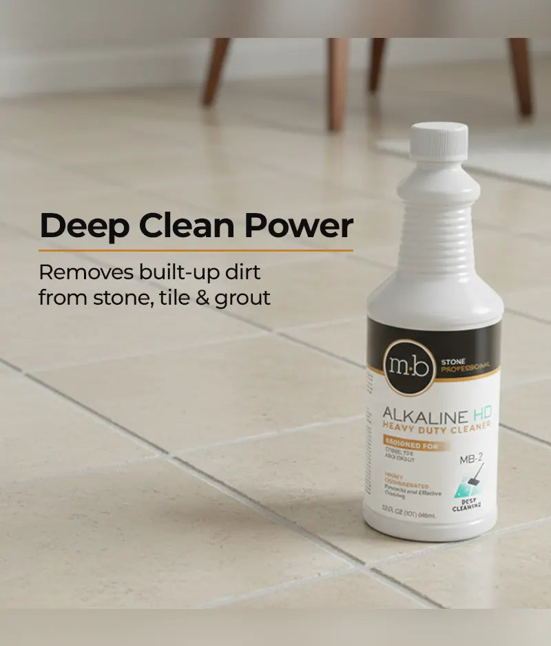 M&B Alkaline HD Heavy Duty Cleaner bottle on a tiled floor with text about deep cleaning power.