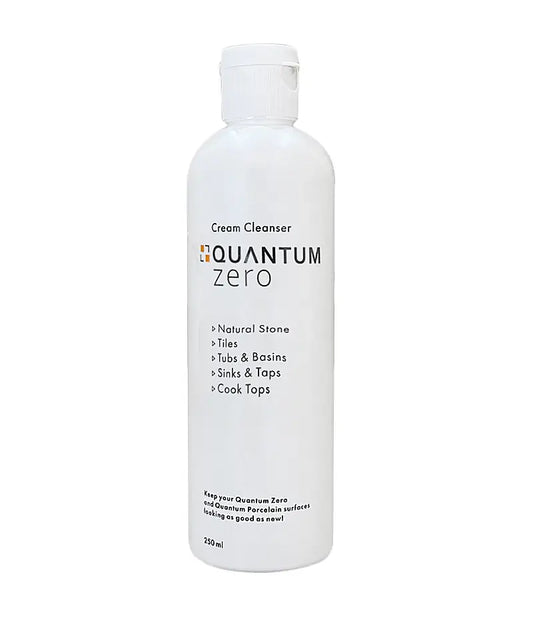 White bottle of Quantum Zero cream cleanser on a white background