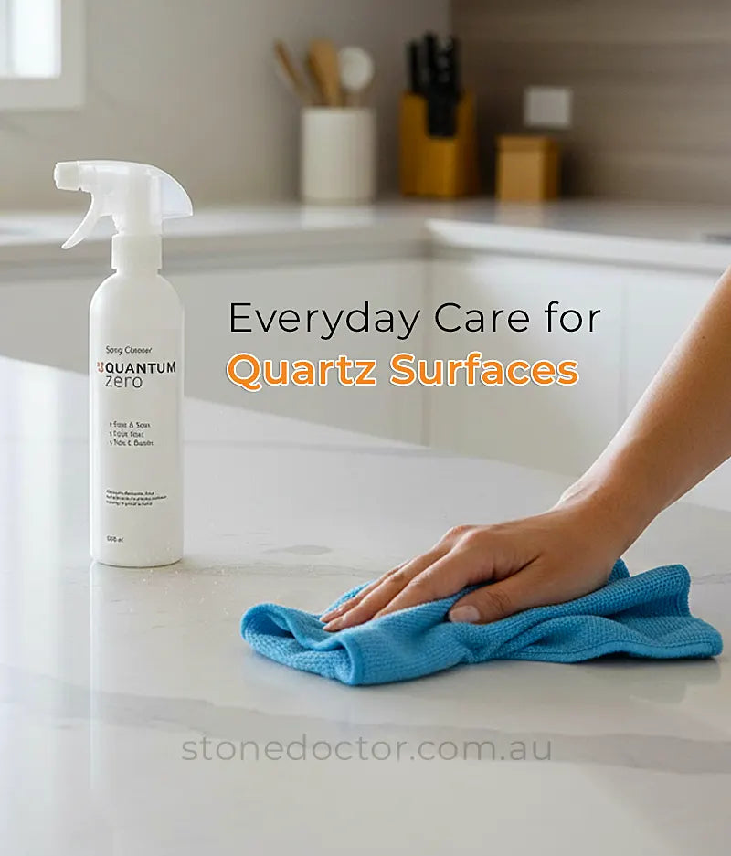 Spray bottle and blue cloth on a quartz countertop with text 'Everyday Care for Quartz Surfaces'.