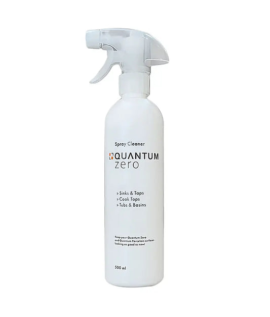 White spray bottle labeled 'Quantum Zero' on a white background