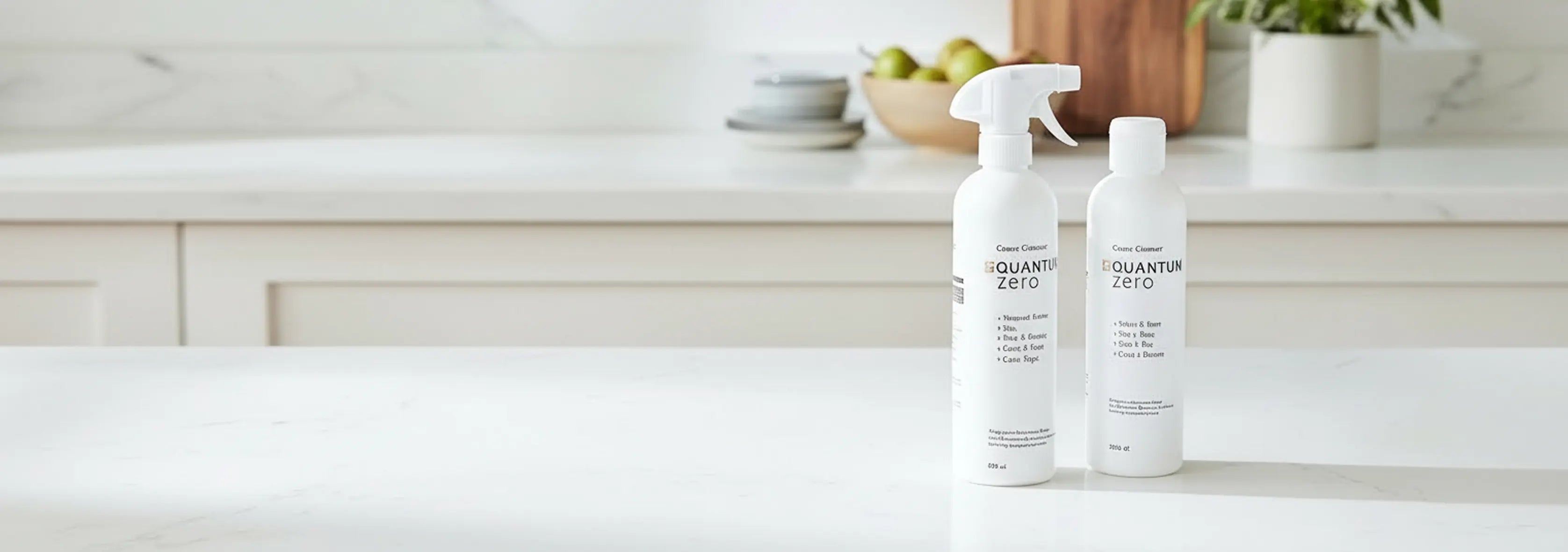 Two bottles of 'Quantum Zero' on a white surface with a neutral background