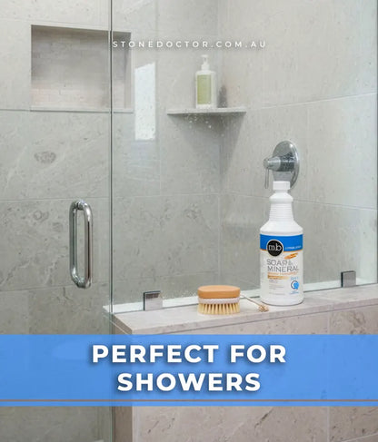 Cleaning product on a shower ledge with 'Stonedoctor.com.au' branding.